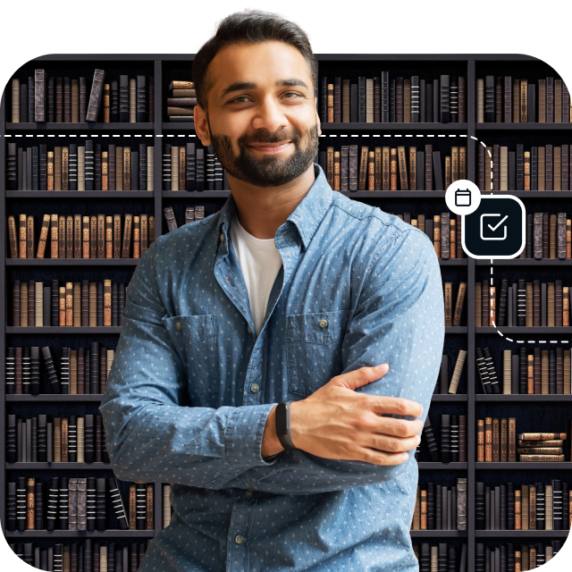 A man stands in front of a large library full of books, symbolizing the massive Usenet archive that Eweka Internet Services offers to Usenet users.