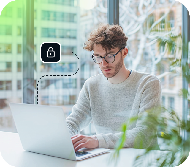 A young man sits at an open laptop, safely accessing Usenet thanks to Eweka’s secure SSL encryption that protects online browsing from prying eyes.