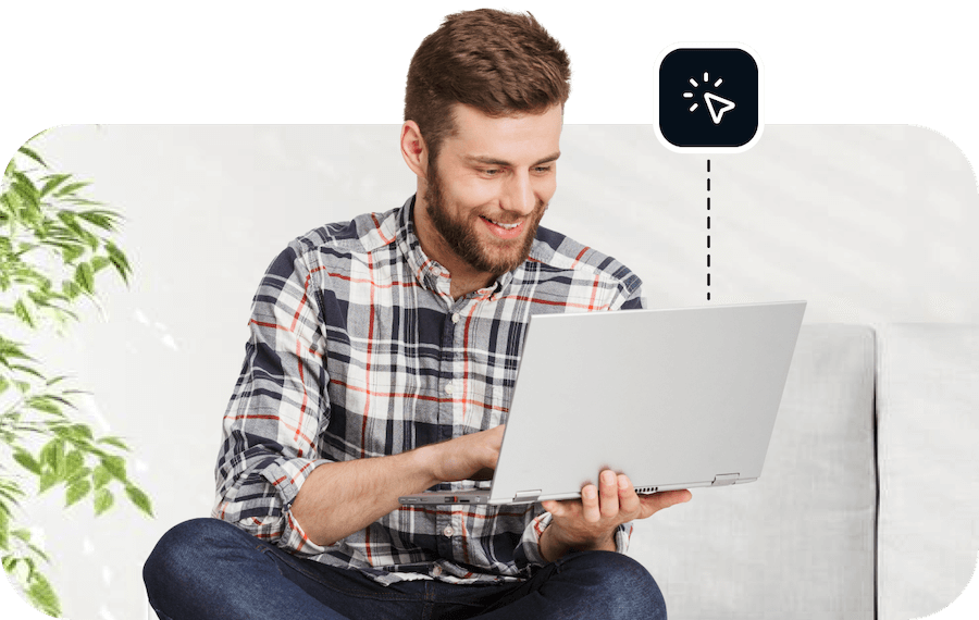 A smiling man has a laptop open in his hands, which is connected to Eweka’s premium ad blocker for advanced security.